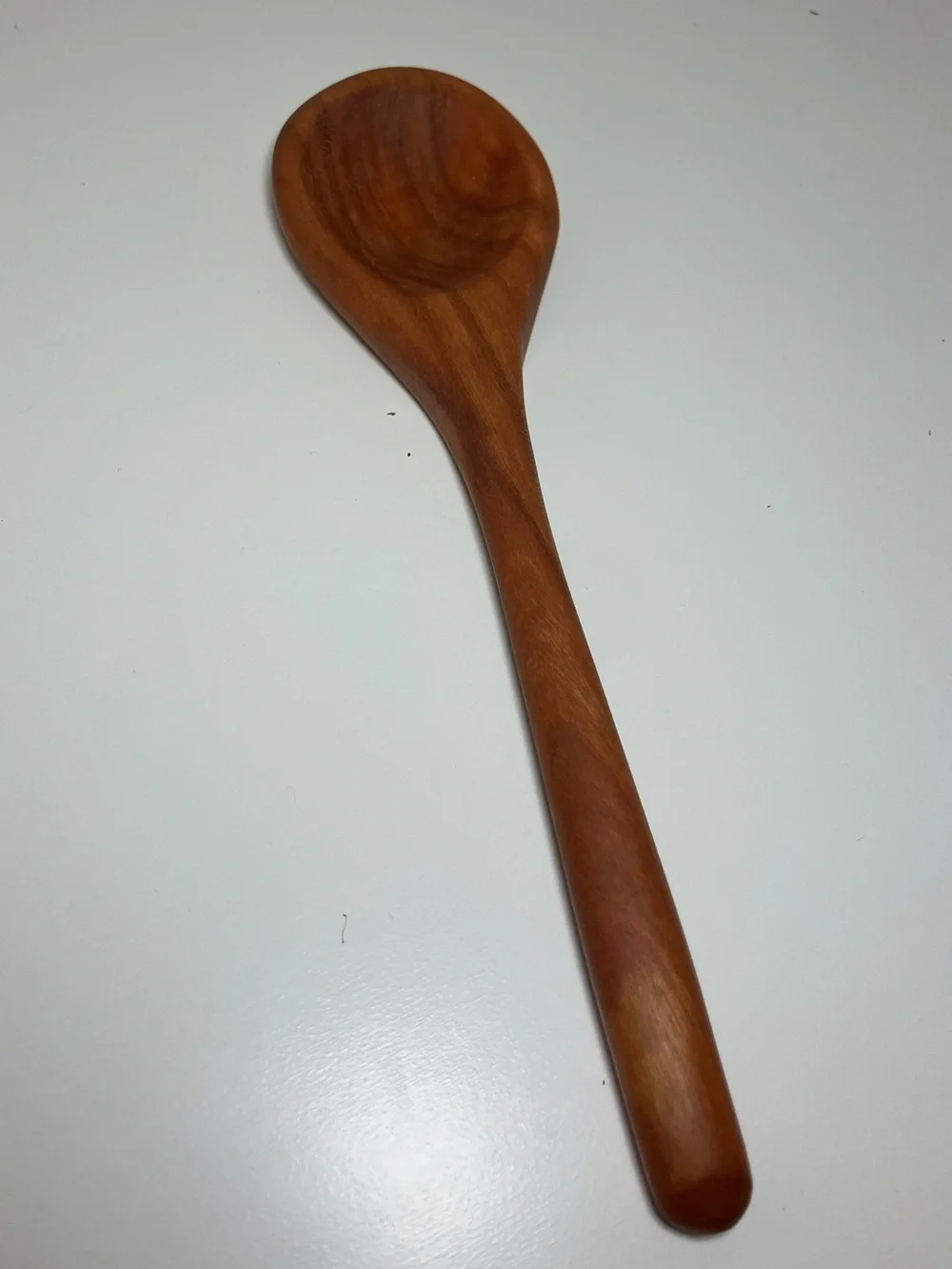 Daisymaeshop Handcarved 8 inch wooden spoon made from cherry wood.